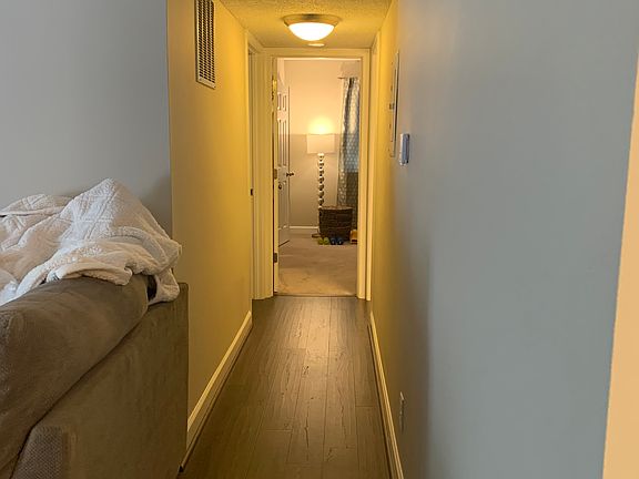 Hallway to bedrooms and bathrooms