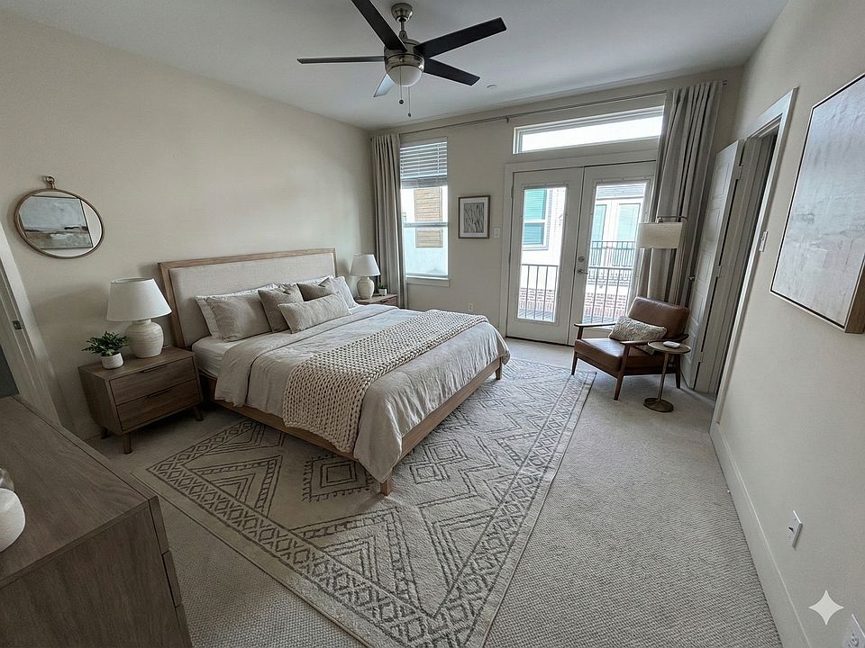 Upstairs master beedroom. Staged with Gemini 3.0