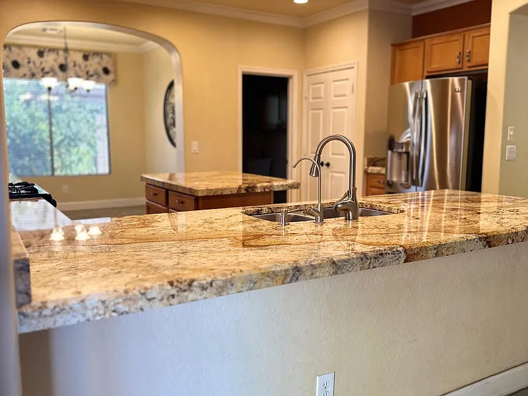 Kitchen bar can fit 5 barstools and it makes it easy to entertain with an open floorplan.