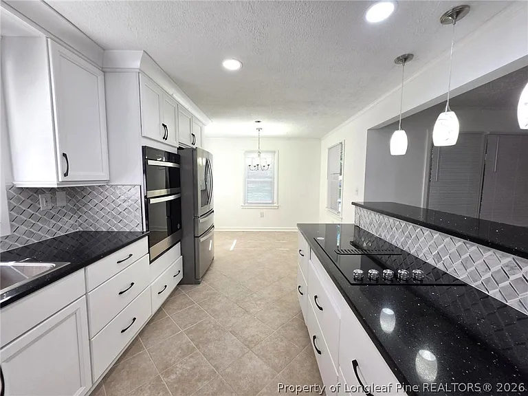 216 Country Club Dr — Photo 14