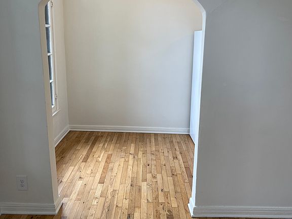 Main room looking into eat-in portion of kitchen.
