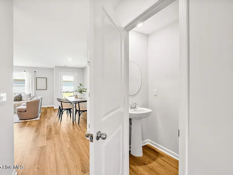 1/2 bath and dining (model)
