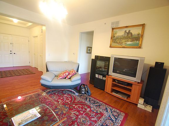 Foyer - hardwood floor, guest closet