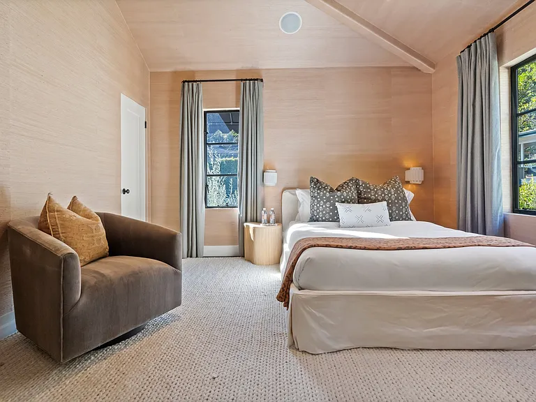 Every element, from the woven pillow to the premium bedding, is carefully chosen.