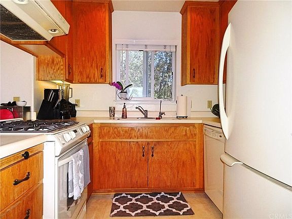 Kitchen rug is different.... you are free to move in your own items, but the microwave will be there.