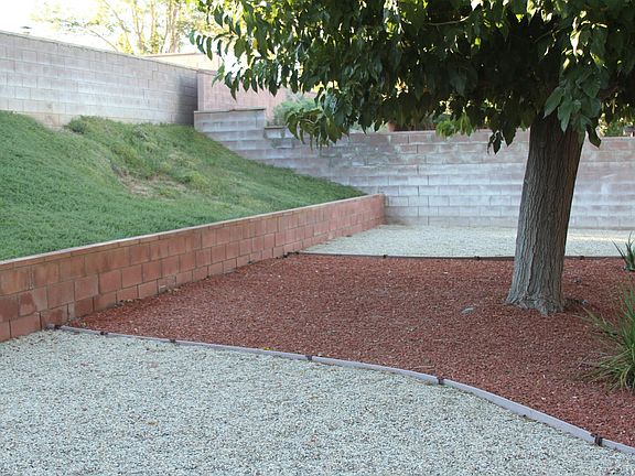 Backyard looking up at hill.