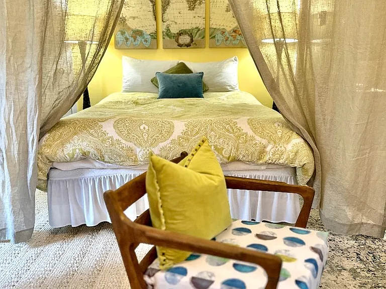 Semi private queen size bed space.