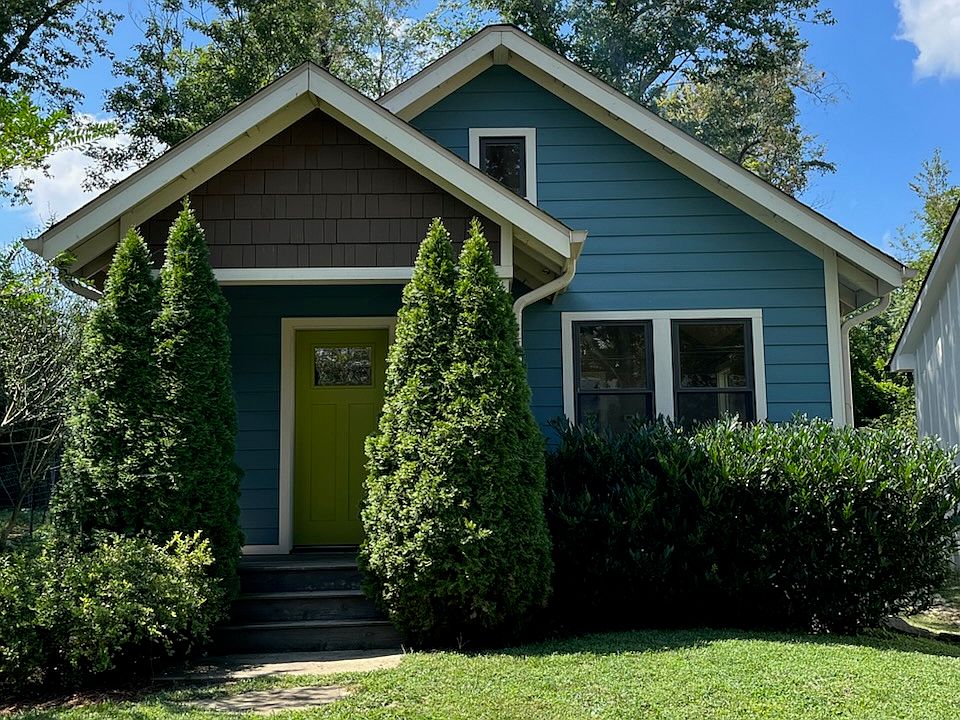 Front of house with flat front yard