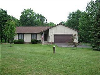 1st image of 10725 N Woods Cir