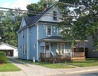 Front with 2 car garage