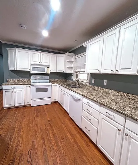 5583 Woodland Dr — Photo 2