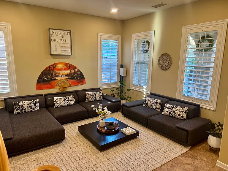 1 of 2 downstairs living rooms