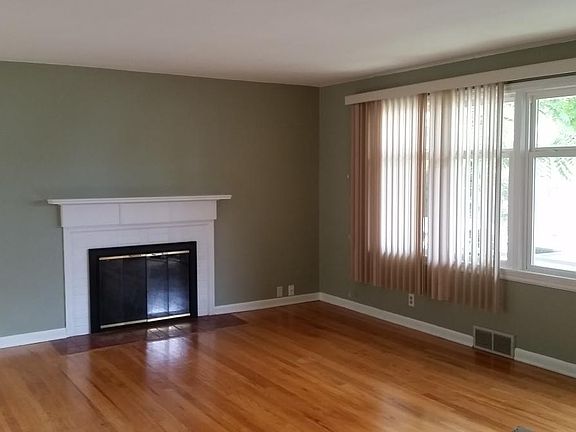 Living room - fireplace and front windows