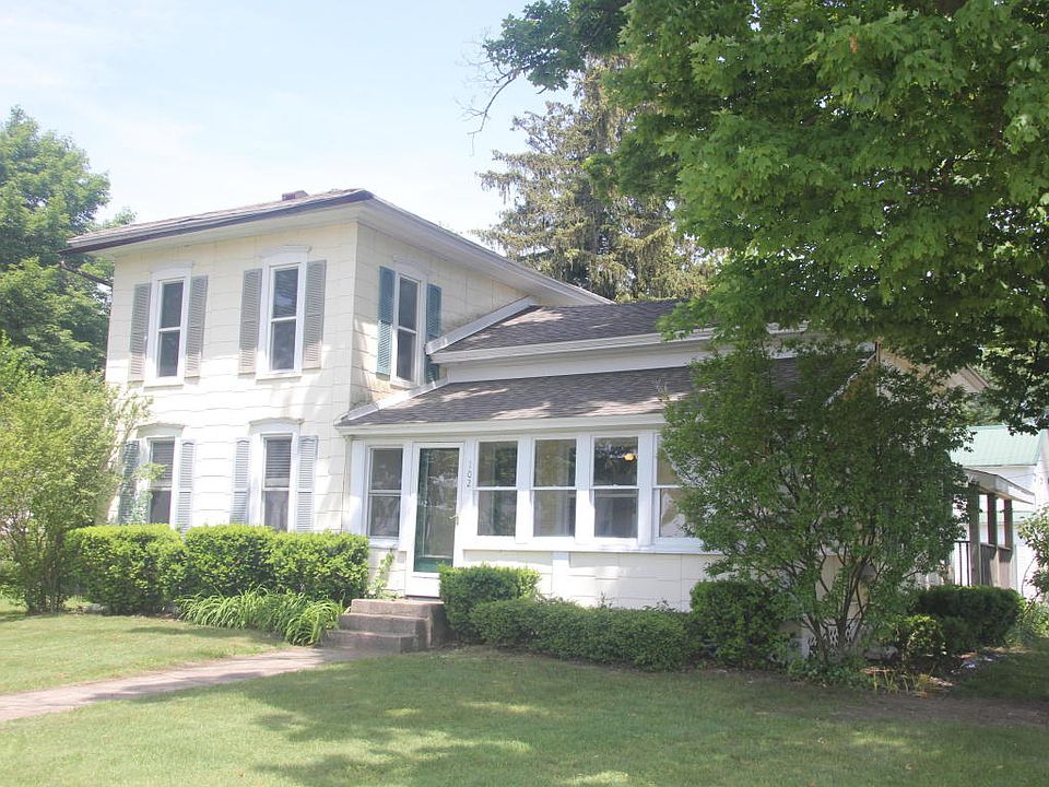 1st image of 102 W 1st St
