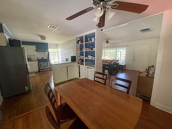 Dining, looking into kitchen and living room