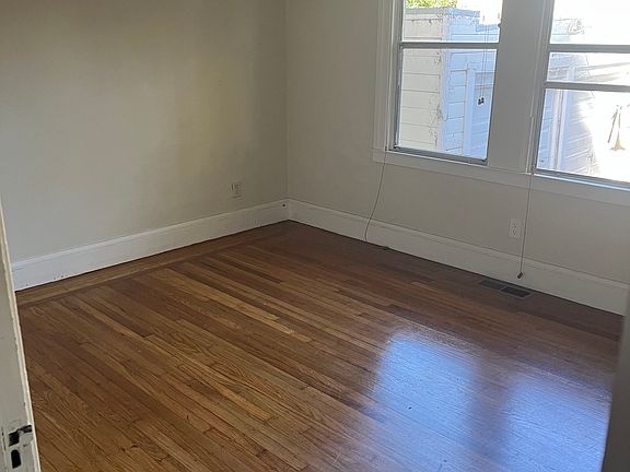 Bedroom with hardwood floors