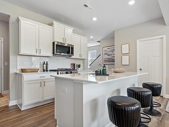 Bright and open design perfect for hosting. (Similar Kitchen)