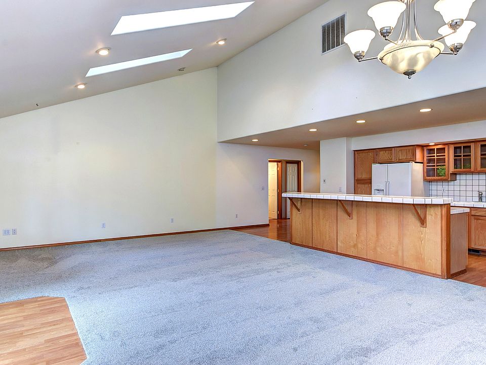 Spacious living area with access to backyard