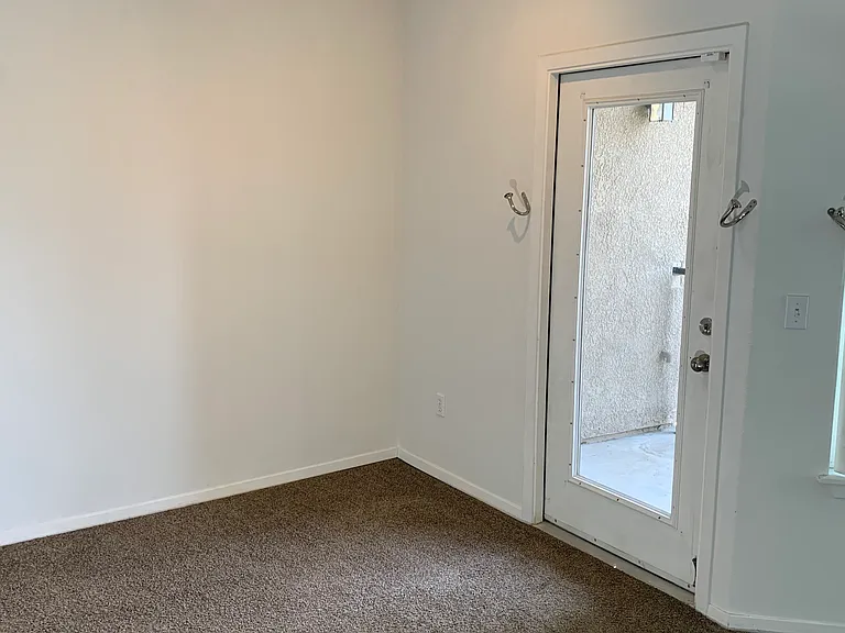 Front room with door to the balcony