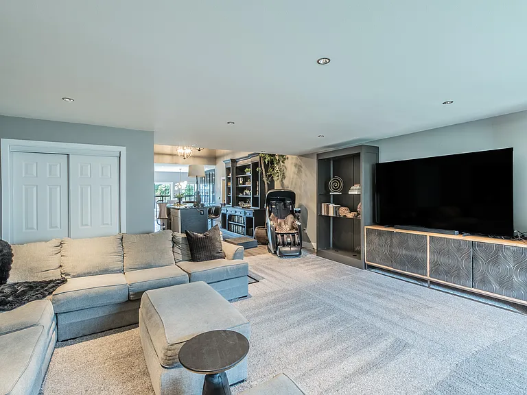 Stretch out and relax in this spacious, designer living area.