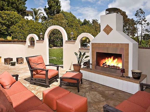 Outdoor fireplace and sitting area