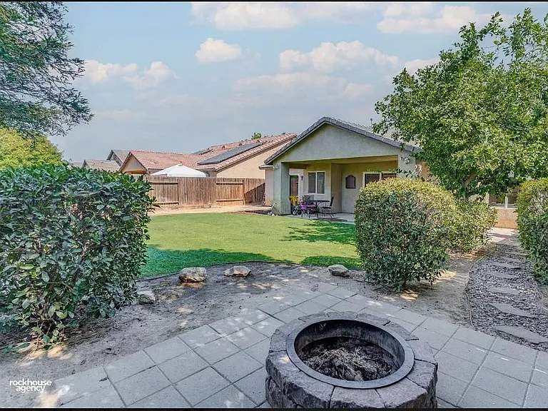 fire pit and pavers in back yard