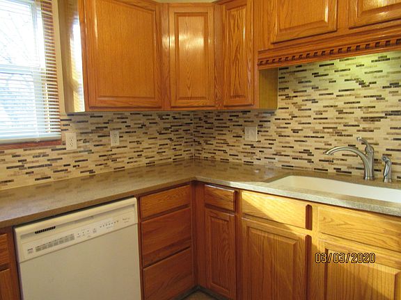 Another picture of kitchen with sun shinning in