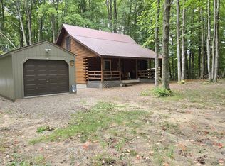 8745 Whispering Pines Dr, Mancelona, MI 49659