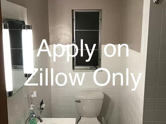Updated bathroom with matching floors to the kitchen, fresh and clean.