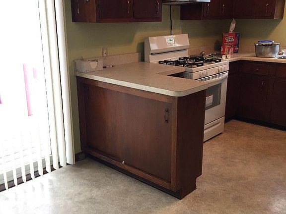 Kitchen and part of the dining area.