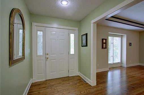 ENTRY W/ BEAUTIFUL HARDWOOD FLOORS