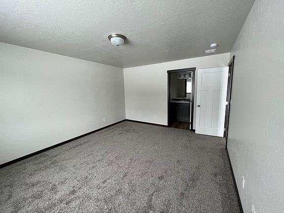Primary bedroom with walk in closet and ensuite
