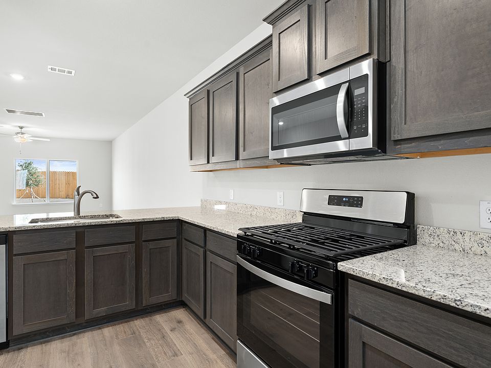 The kitchens have energy-efficient, stainless steel appliances.
