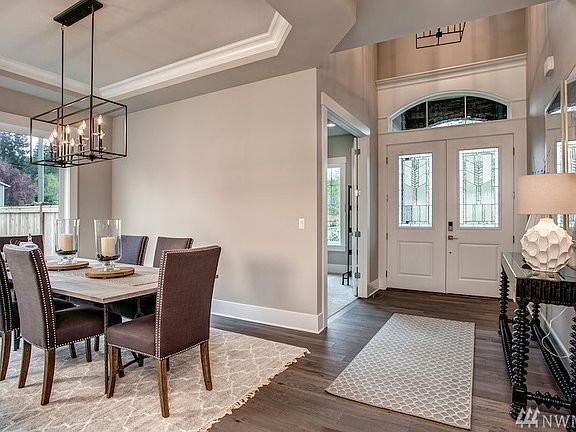 Photos are of a similar plan; details will vary due to builder and buyer options. All of Foxwoods' homes will include 48" Thermador Pro-Series Range and Hoods, stacked cabinets w/crown extending up to the ceilings, 5 standard-options for cabinets as well as upgrade options....