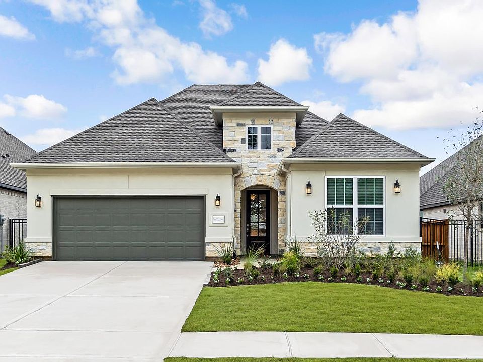 Beautiful stucco and stone exterior on Bandera High Plains home