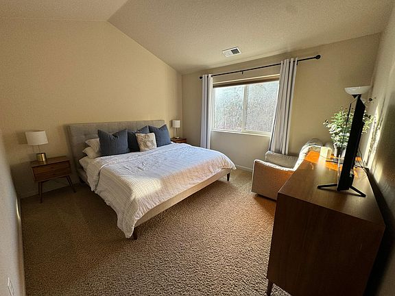 Primary Bedroom includes walk-in closet (not shown), and primary bathroom with shower + soaking tub.