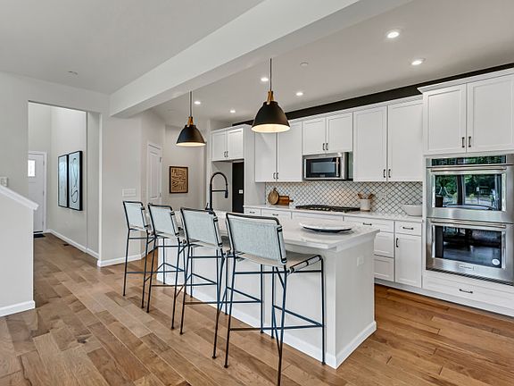 Kitchen with Large Island and Pendant Lighting