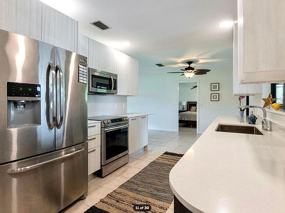 Stainless steel appliances, quartz countertops and new cabinets
