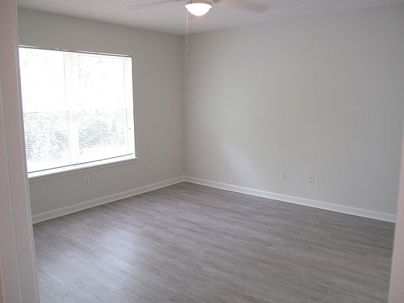 Master bedroom faces back of property