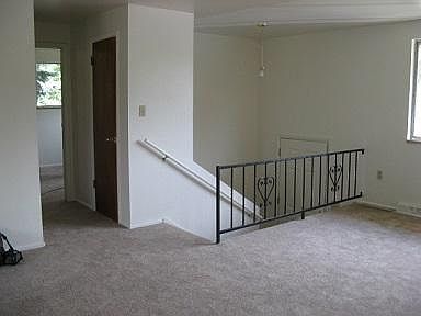 Towards entry, hall and front bedroom