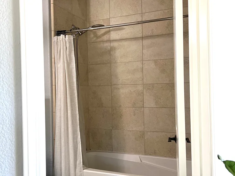 shower and deep tub combination.