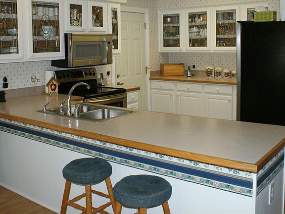 Open Kitchen with Plenty of Cupboards and Counter Space