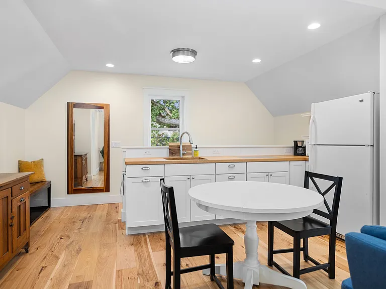The beautiful entry, kitchen and dining area.