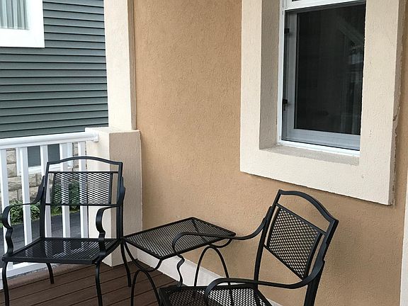Front porch furniture to enjoy the peaceful neighborhood