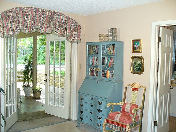 Master has French doors leading to patio and pool.