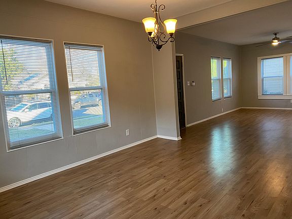 Larding dining room with lots windows.