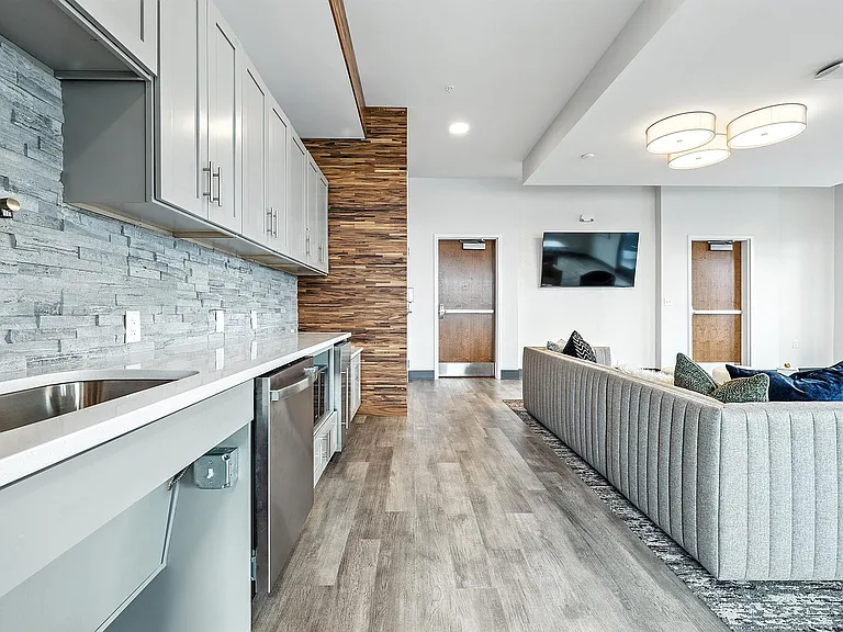 Open Community Lounge Featuring a Kitchen
