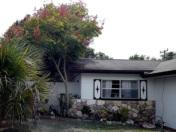 Left side of house facing 
