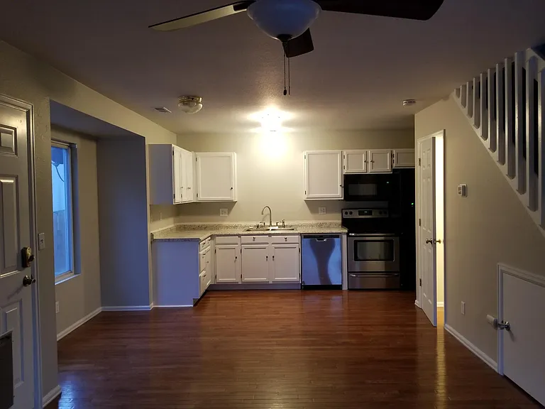 Open concept kitchen, dining and living room