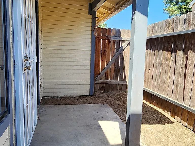 Dining Area Covered Patio and Fenced Yard Area